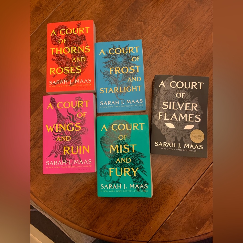 A Court of Thorns and Roses Series by Sarah J. Maas
Excellent condition